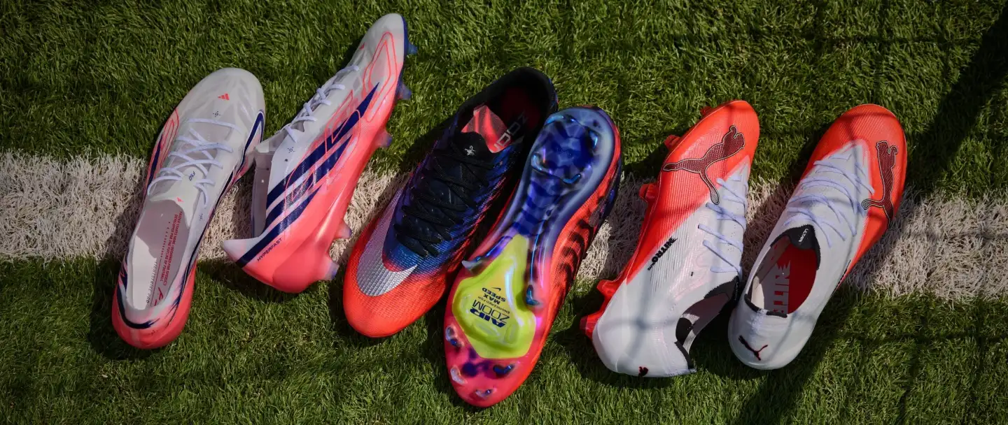 Football boots on the pitch
